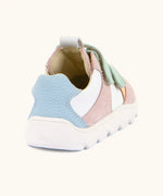 Back of Froddo barefoot zeru Spring kids shoes in pink and white Showing blue padded ankle support and pull tab on tongue
