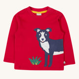 Frugi kids adventure applique top berry red/sheepdog top available at Babipur. A GOTS organic top in vibrant red with long sleeves. Features a playful dog applique on the front and popper fasteners on the shoulder