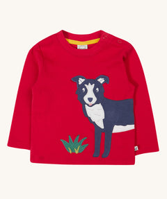 Frugi kids adventure applique top berry red/sheepdog top available at Babipur. A GOTS organic top in vibrant red with long sleeves. Features a playful dog applique on the front and popper fasteners on the shoulder