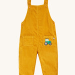 Frugi Adley Cord Dungarees - Gold/Tractor. Yellow cord dungarees with an embroidered tractor on the front pocket