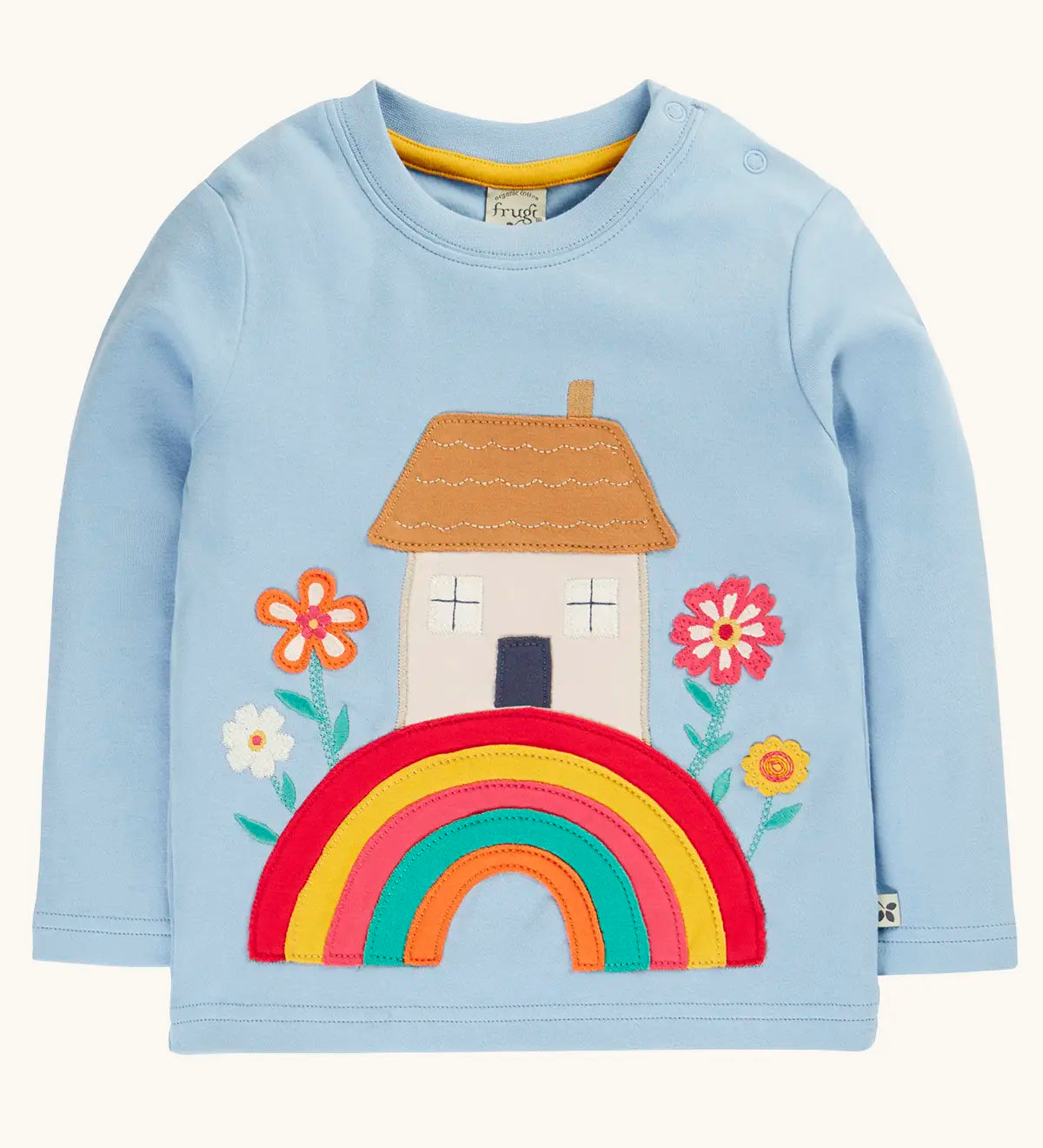 Frugi GOTS 100% organic cotton kids top in light blue with a cute house on a rainbow applique. Features popper fasteners on the shoulder