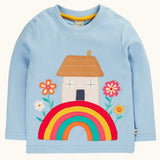 Frugi GOTS 100% organic cotton kids top in light blue with a cute house on a rainbow applique. Features popper fasteners on the shoulder