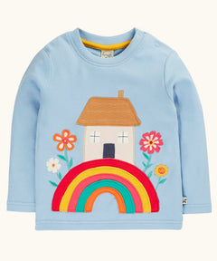 Frugi GOTS 100% organic cotton kids top in light blue with a cute house on a rainbow applique. Features popper fasteners on the shoulder