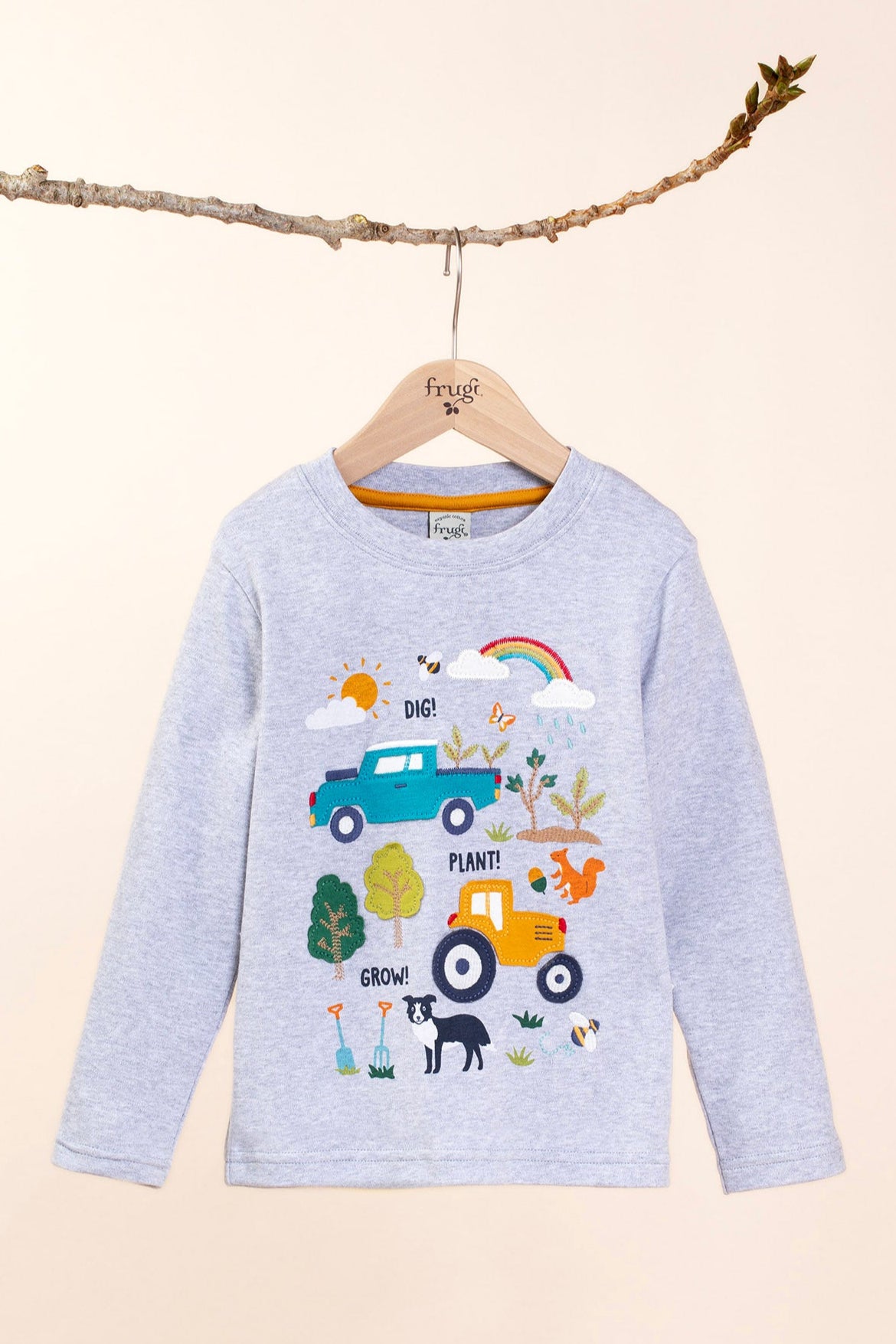 Frugi children's Adventure Organic Cotton long sleeved Top in Grey with various Farm inspired appliques on the front hanging on a branch and available at Babipur.