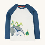 Frugi Alfie Raglan Top - Navy Blue/Anteater. An organic cotton, long sleeve, raglan top with navy blue sleeves, a white body and a large anteater applique on the front
