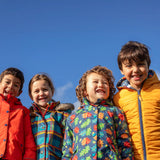 Children wearing Frugi's reversible, playtime, 3 in 1 rambler and tartan parka coats 