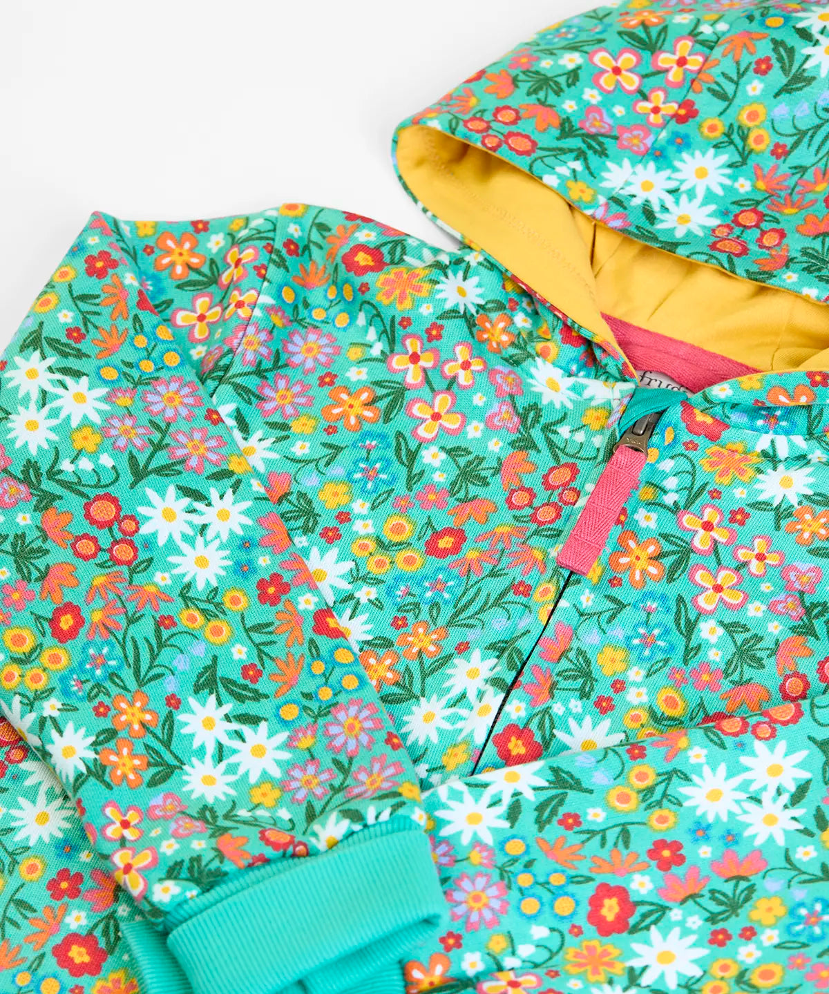 Frugi GOTS 100% organic cotton all in one hooded snuggle suit in green with a repeating floral design and yellow inner liner on the hood