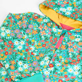 Frugi GOTS 100% organic cotton all in one hooded snuggle suit in green with a repeating floral design and yellow inner liner on the hood