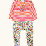Frugi 100% GOTS organic cotton all in one baby outfit including a pink and orange striped long sleeve top with a cute highland cow applique and floral bottoms