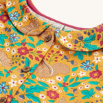 A closer look at the buttons and collar on the Frugi Autumn Dress - Autumn Friends