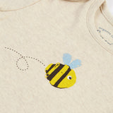 A closer look at the buzzy bee print on the short sleeve body suin from the Frugi Baby Muslin Gift Set - Buzzy Bee