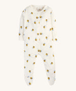 The buzzy bee babygrow from the Frugi Baby Muslin Gift Set - Buzzy Bee. A cream cotton fabric with happy bee prints