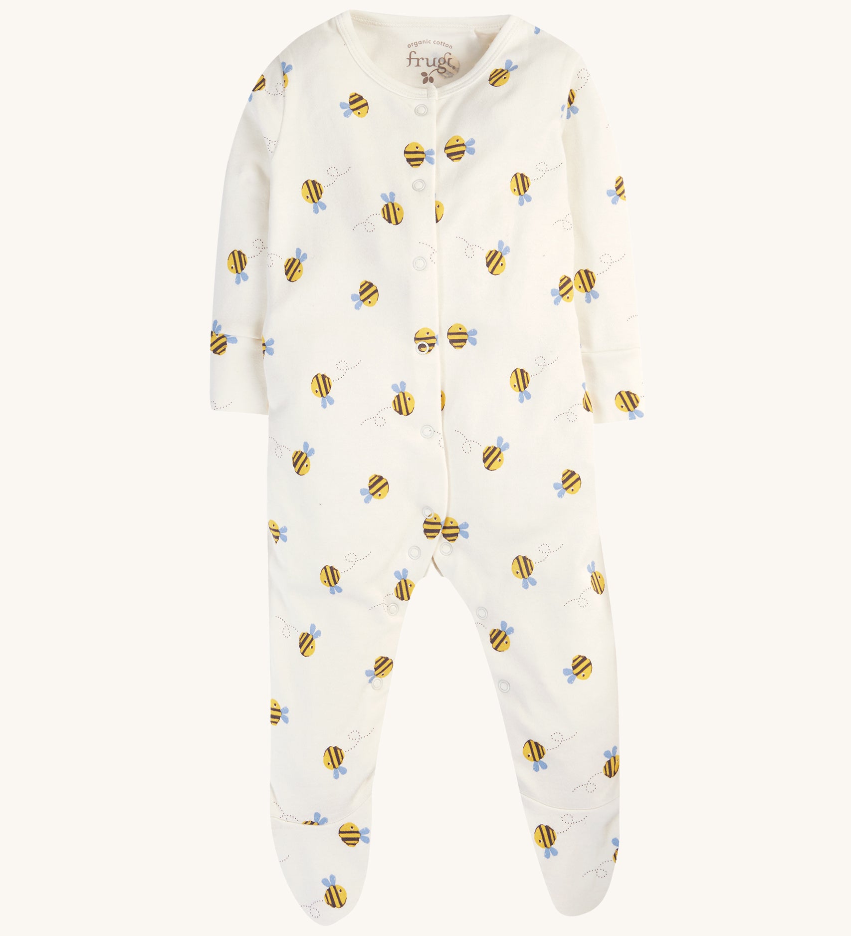 The buzzy bee babygrow from the Frugi Baby Muslin Gift Set - Buzzy Bee. A cream cotton fabric with happy bee prints