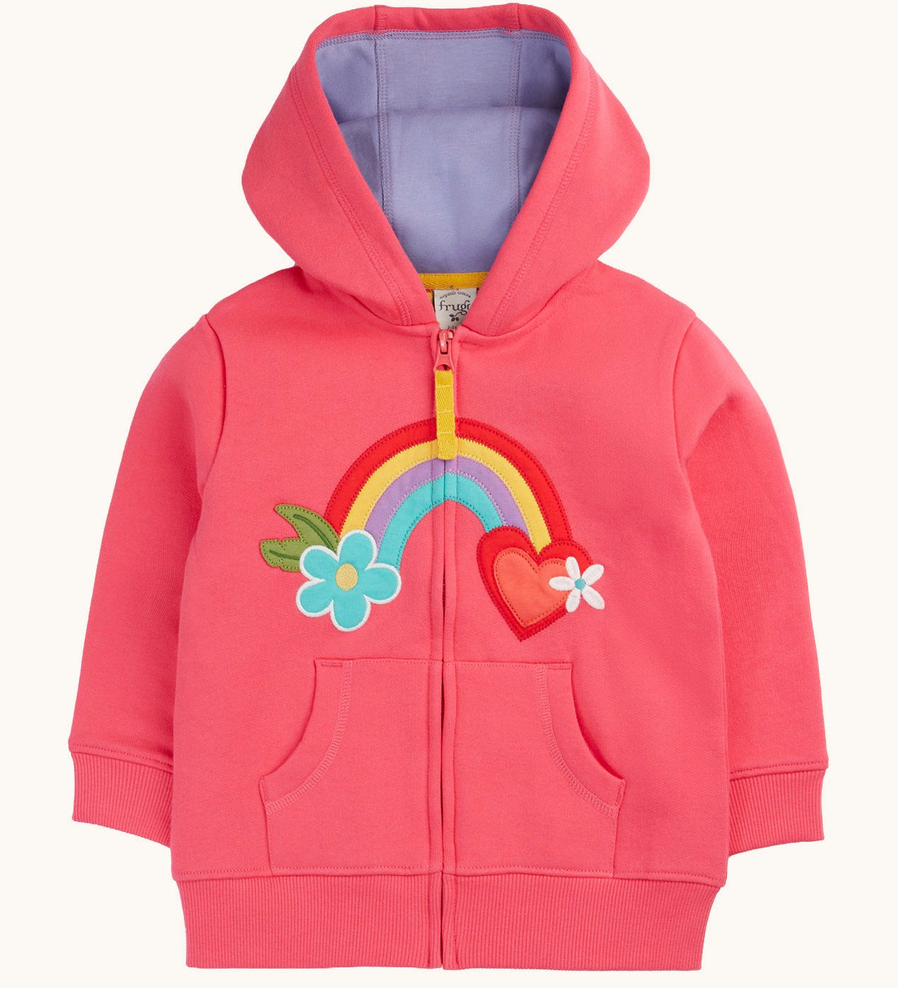 Frugi organic cotton zipped  hoodie laid flat. In light pink and a purple inner lining. Has a rainbow patch in the middle with a blue flower on one end and red heart on the other. 