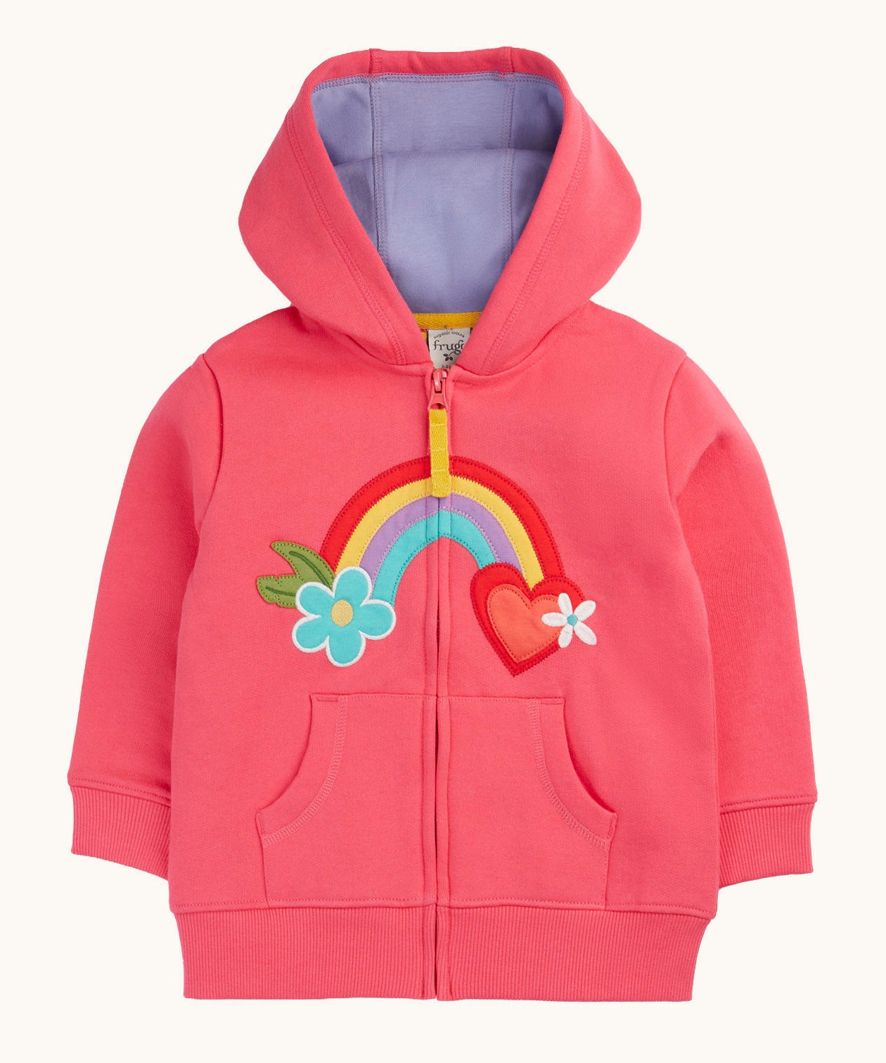 Frugi organic cotton zipped  hoodie laid flat. In light pink and a purple inner lining. Has a rainbow patch in the middle with a blue flower on one end and red heart on the other. 
