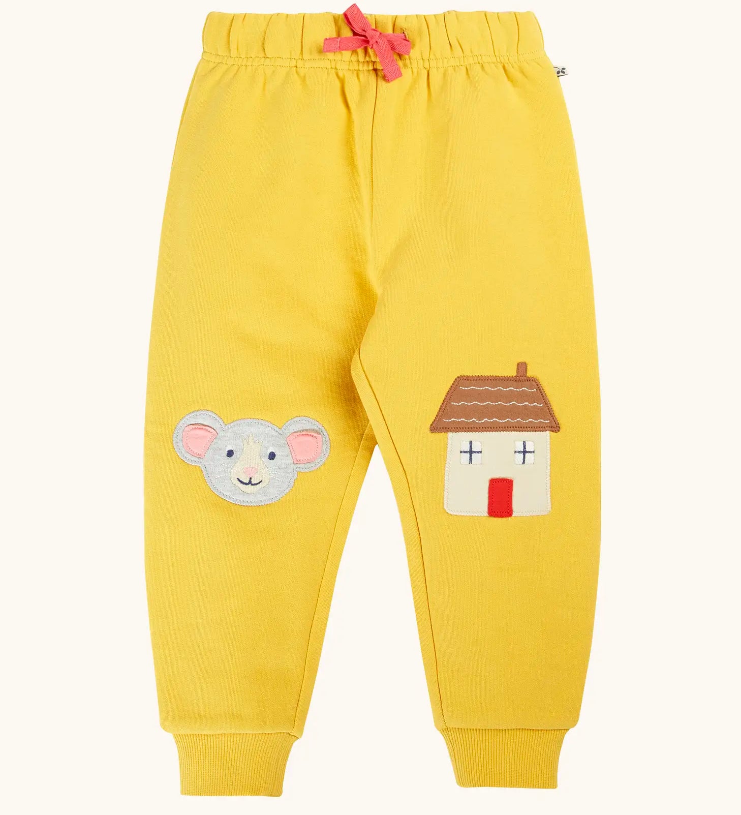 Frugi GOTS 100% organic cotton joggers in yellow with a cute mouse and house appliques on the knees. Features an elasticated wait band and pink drawcord