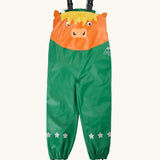 Frugi character puddle buster trousers showing a green leg and a highland cow upper body panel. Features elasticated shoulder straps