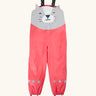 Frugi character puddle buster trousers showing a pink leg and a playful grey cat upper body panel. Features elasticated shoulder straps