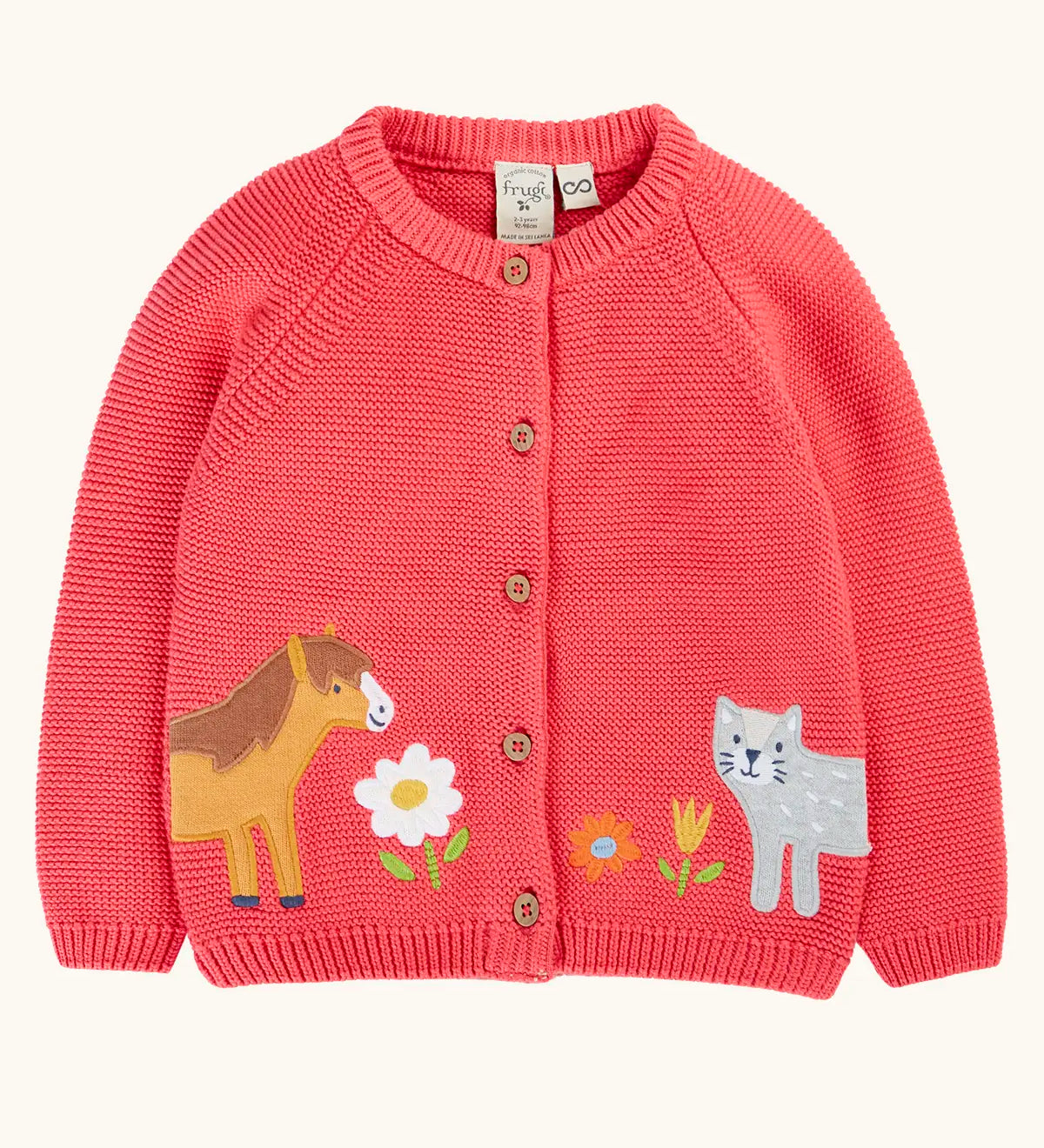 Frugi 100% GOTS organic cotton kids knitted cardigan in soft pink with a cute horse and cat appliques on the bottom. Features wooden button fasteners