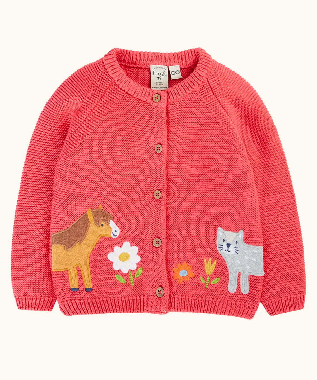 Frugi 100% GOTS organic cotton kids knitted cardigan in soft pink with a cute horse and cat appliques on the bottom. Features wooden button fasteners