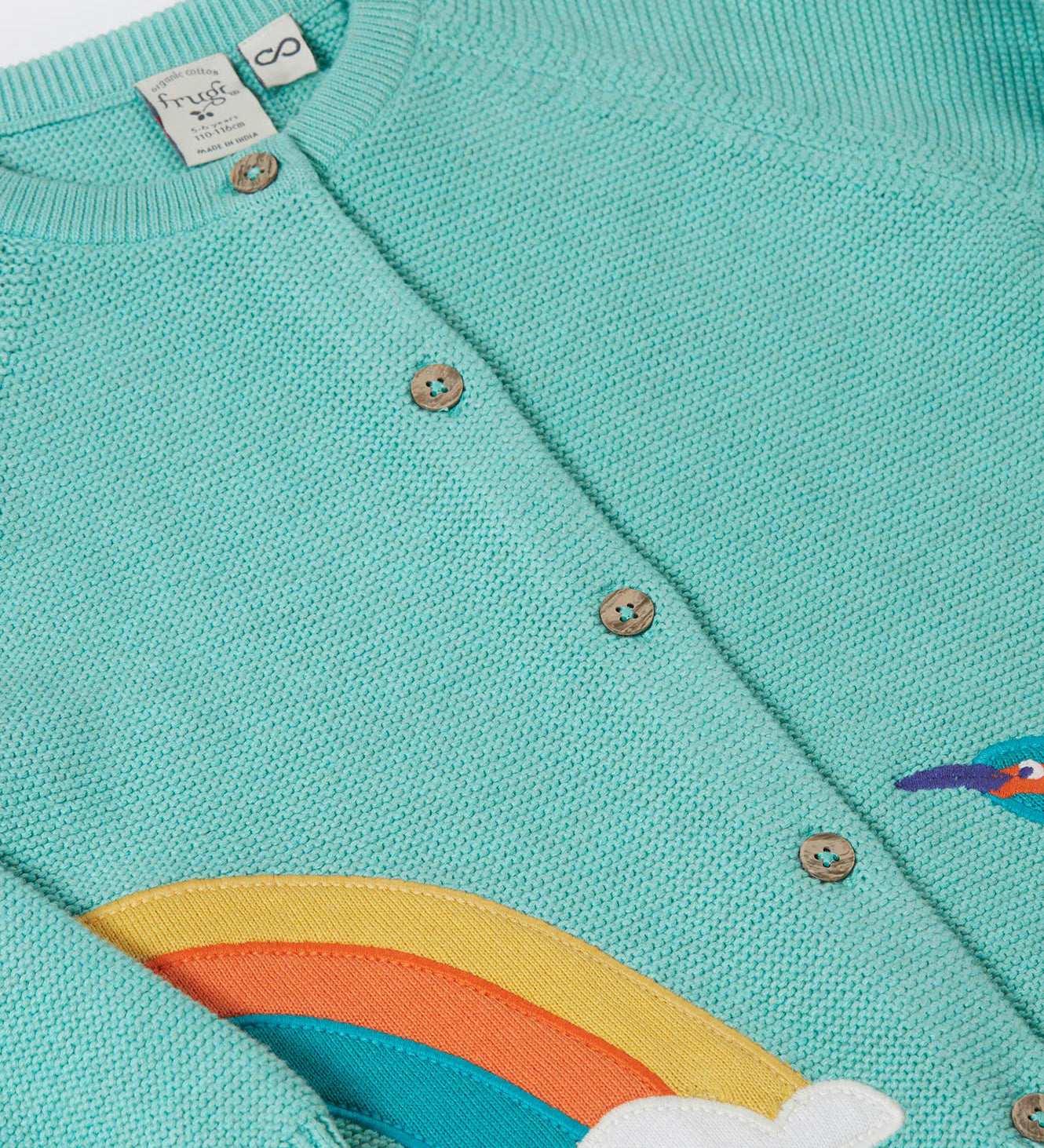 A close up of the button fasteners on the Frugi colby knitted cardigan in lichen / kingfisher available at Babipur. 