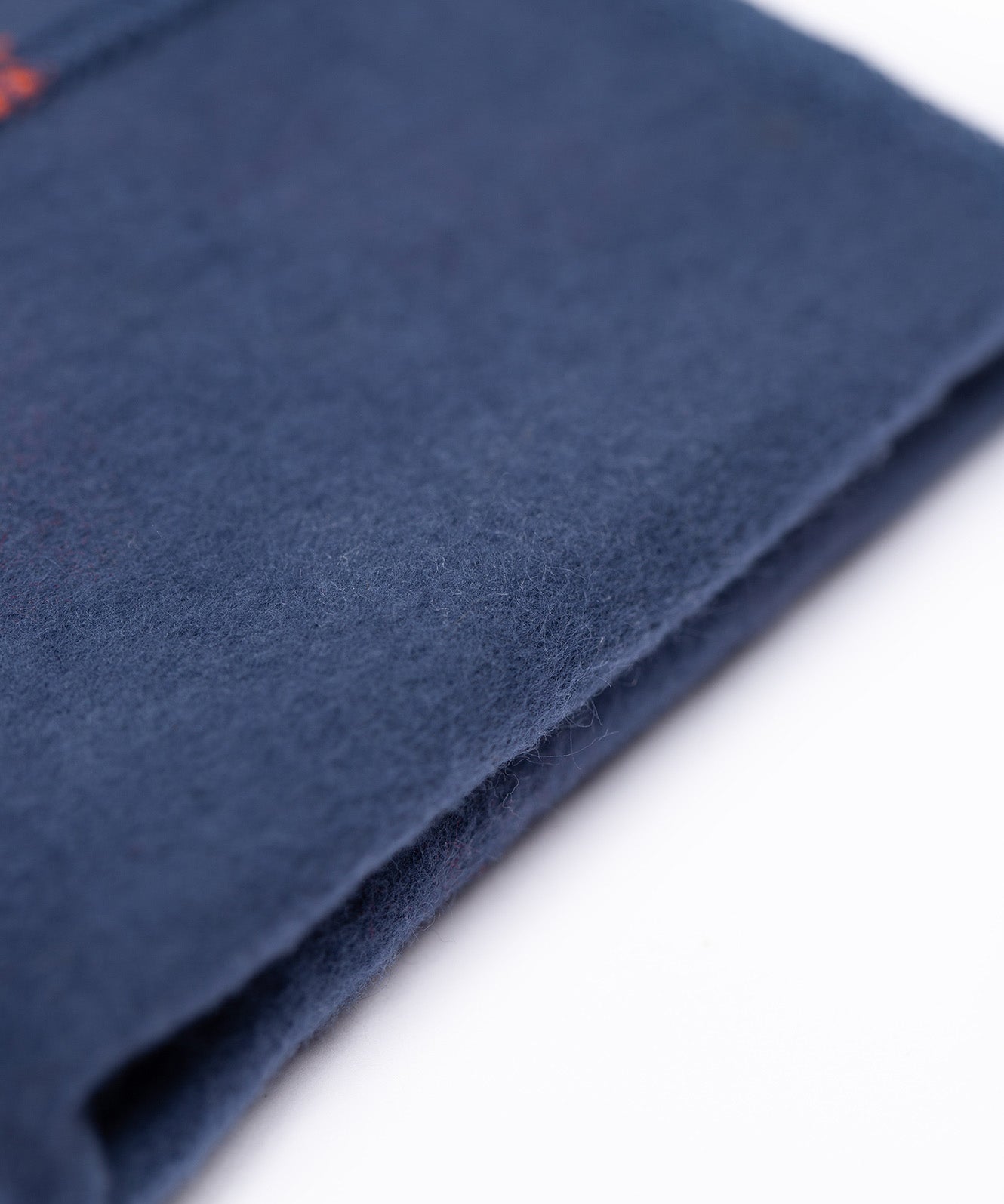 A close up of the warm, cosy navy inner lining on the Frugi cosy leggings in navy/dragon skies available at Babipur. 