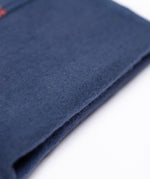 A close up of the warm, cosy navy inner lining on the Frugi cosy leggings in navy/dragon skies available at Babipur. 