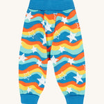 Frugi Cosy Parsnip Pants - Wavy Stars/Protect Your Planet. Made from comfy, organic cotton to fit over cloth nappies, these bottoms have long elasticated rib cuffs that unfold, and have colourful rainbow waves stripes with white stars all over