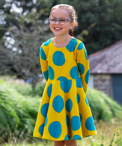 Frugi Cosy Skater Dress in yellow and blue Super Spot with long sleeves, made from organic cotton.