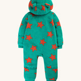 The back of the Frugi Cosy Ted Snuggle Suit - Bonfire Stars, showing the hood, green fleece with orange stars