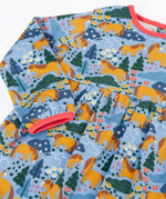 Frugi kids dress in light blue showing close up of the playful repeating shetland horse print and light pink trim on blue organic cotton fabric