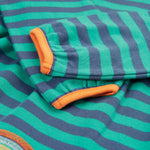 A closer look at the striped sleeves and orange detail on the Frugi Dolcie Dress - Iguana Stripe/Tiger