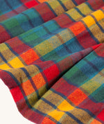 A closer look at the dress skirt and check print of the Frugi Agnes Dress - Merry Rainbow Check