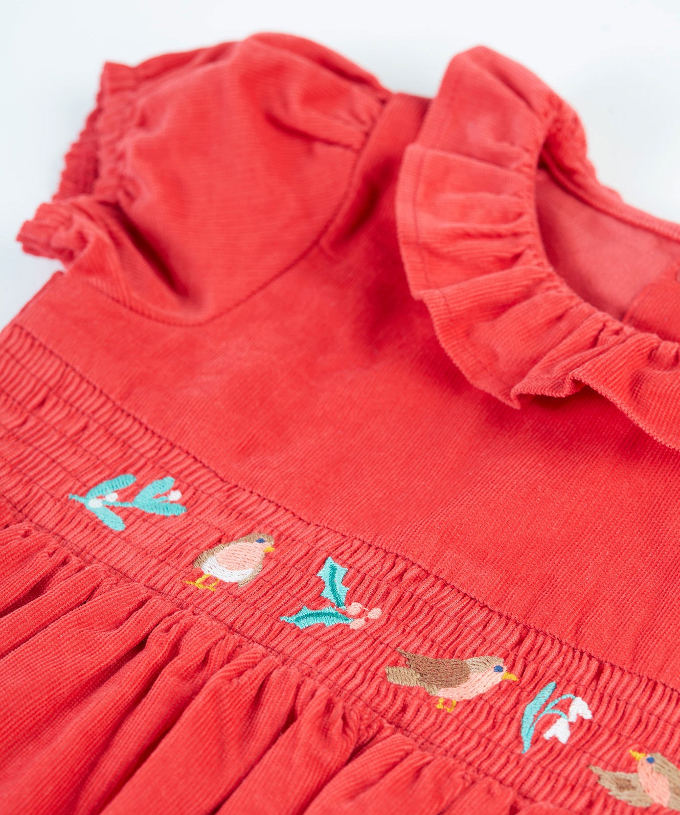 A closer look at the frill collar and robin embroidery on the front of the Frugi Amilie Party Dress - True Red/Robin