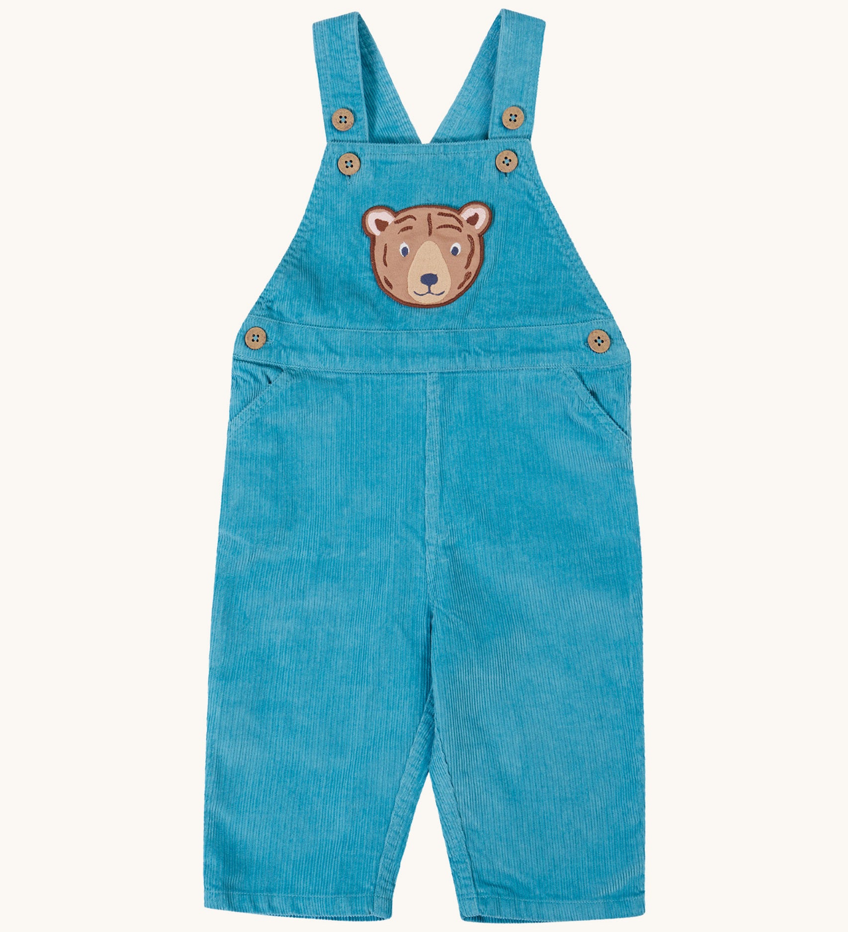 Frugi durgan cord dungarees in boat blue available at Babipur. GOTS organic cotton dungarees with a cute brown bear patch on the top panel. Features button fasteners for a secure fit and size adjustment