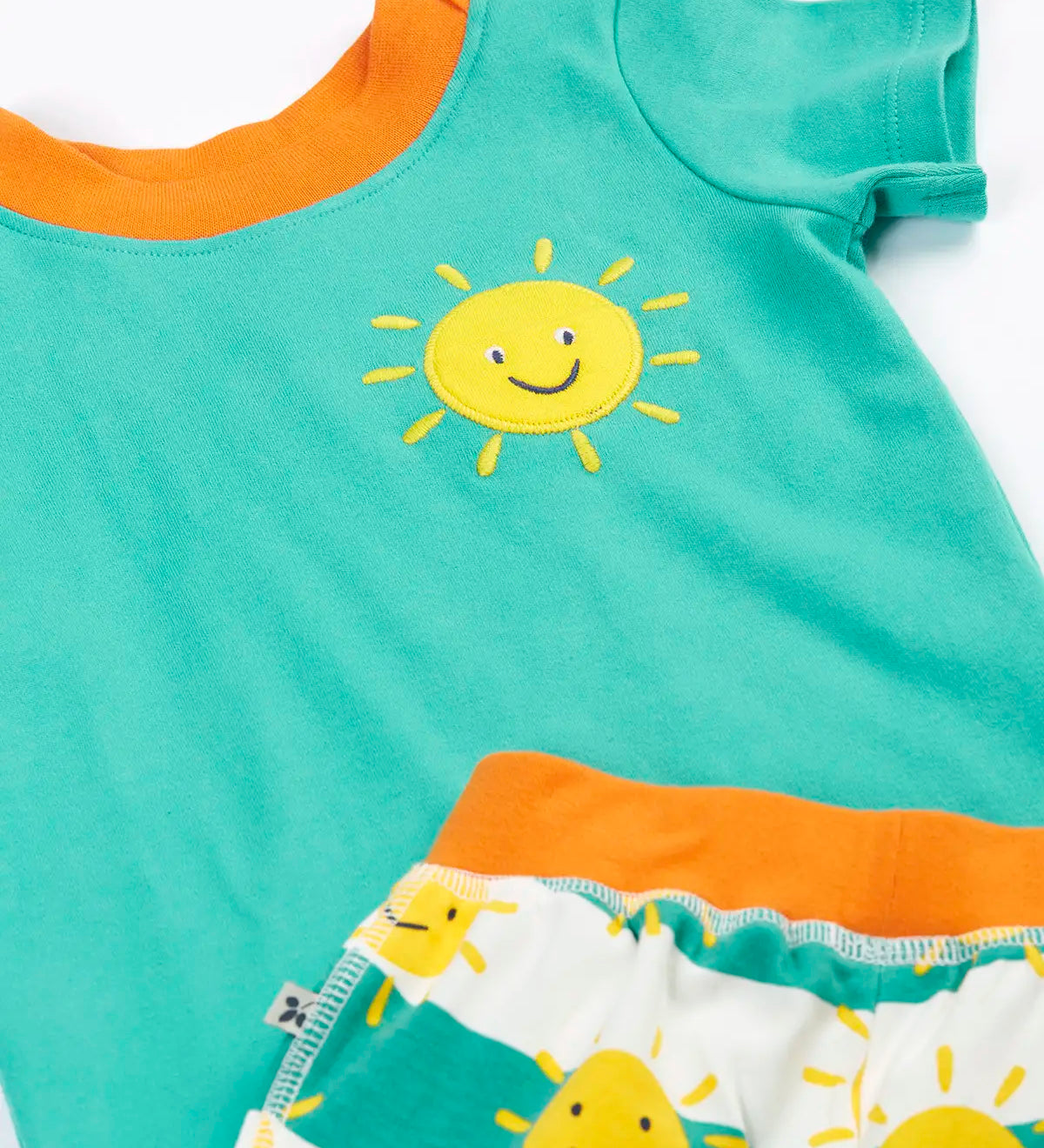 GOTS organic cotton Frugi aqua t-shirt showing a yellow sun patch on the chest and orange collar trim