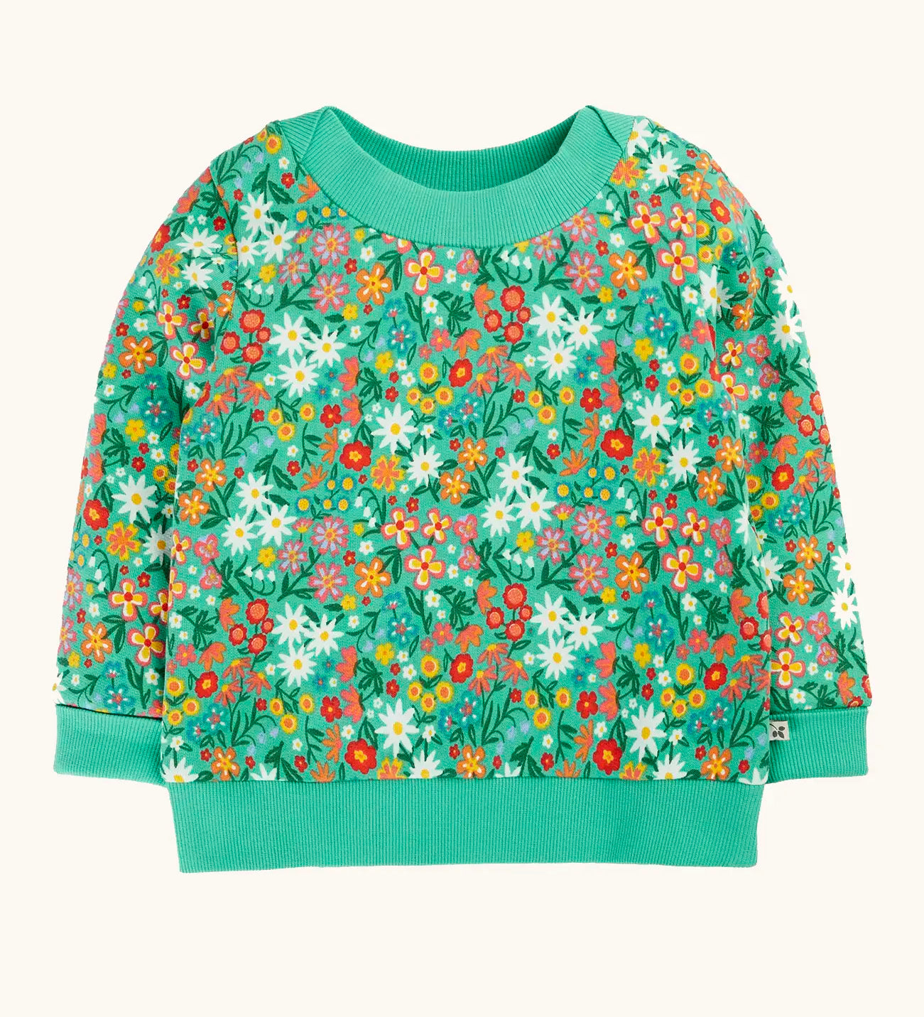 Frugi GOTS 100% organic cotton kids jumper in green with a repeating colourful floral design. Features elasticated cuffs, neck line and hem