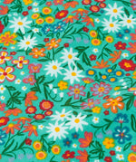 Frugi GOTS 100% organic cotton kids jumper in green showing a close up of the repeating colourful floral design