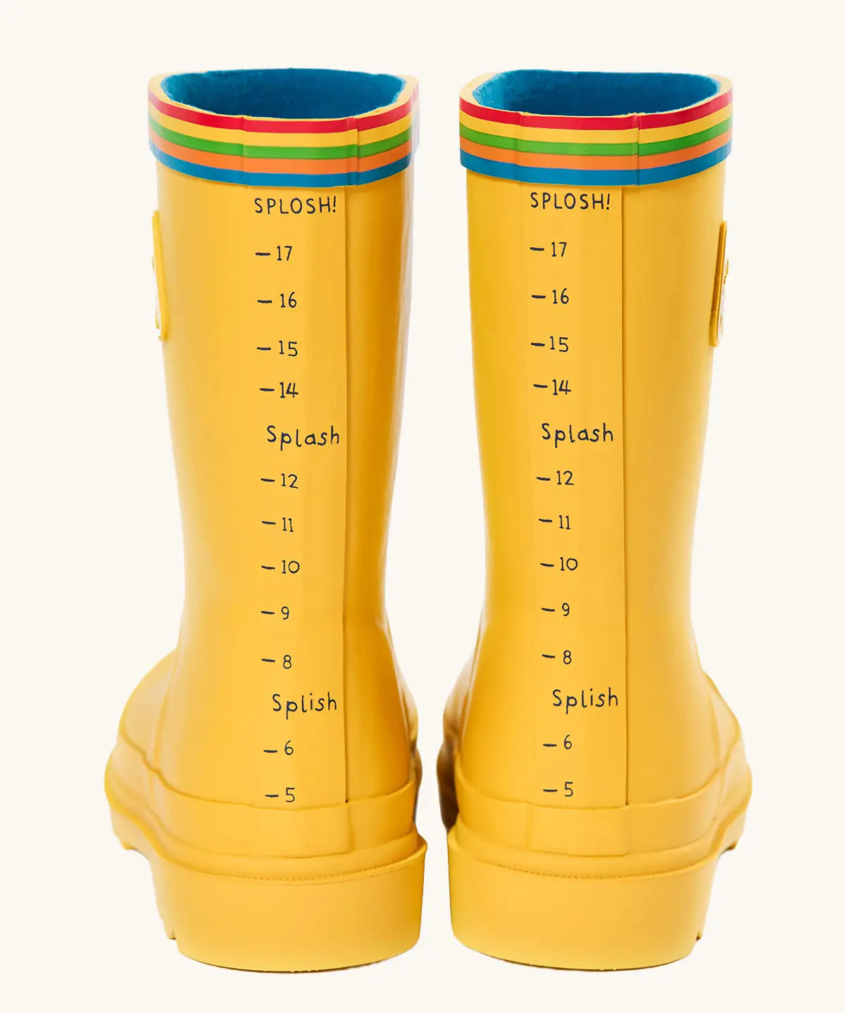 Back of the Frugi natural rubber, waterproof puddle buster wellingtons in yellow showing the rainbow strip on the top and a fun splash meter 