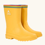 Frugi natural rubber, waterproof puddle buster wellingtons in yellow with a rainbow strip around the top