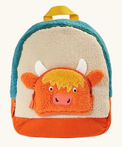 Frugi Highland cow fleece character backpack showing a cream front panel, with a Highland cow zipped pocket, blue top panel and orange cord bottom panel