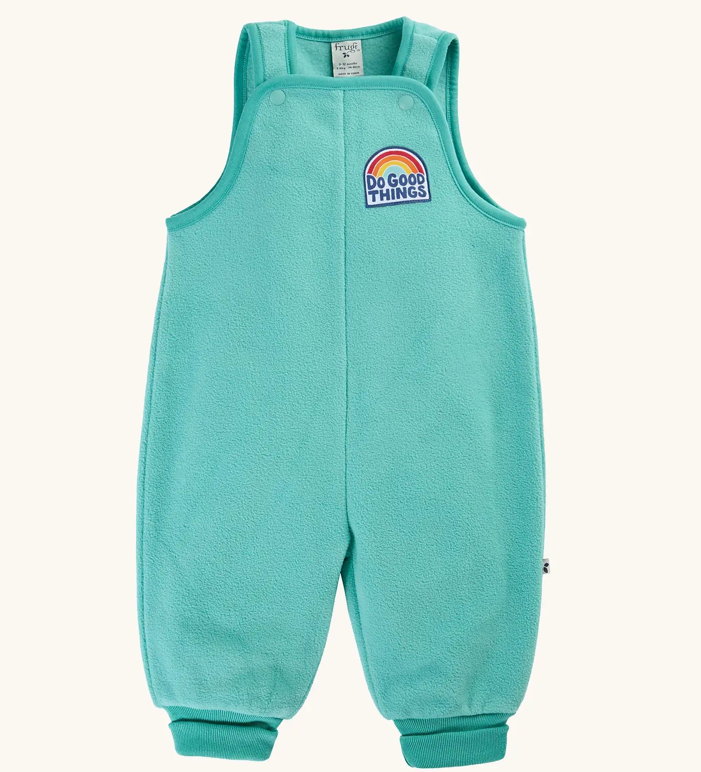 Frugi Flurry Fleece Dungarees in light teal Moss with elasticated cuffs and a 'do good things' chest emblem.