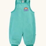 Frugi Flurry Fleece Dungarees in light teal Moss with elasticated cuffs and a 'do good things' chest emblem.