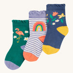 Frugi Freya Frilled Socks 3 Pack - Rainforest Friends. Organic Cotton frill socks in lovely 'Rainforest Friends' designs, one pair comes in navy with delicate flowers and yellow heels and toes, one green pair features a flamingo with lilac heels and cuffs, and the other comes in a lilac stripe with a rainbow on the ankles