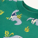 The elasticated rib neck collar on the Frugi Superb Sweatshirt - Anteater Parade. The image also shows the repeat anteater print on the sweatshirt