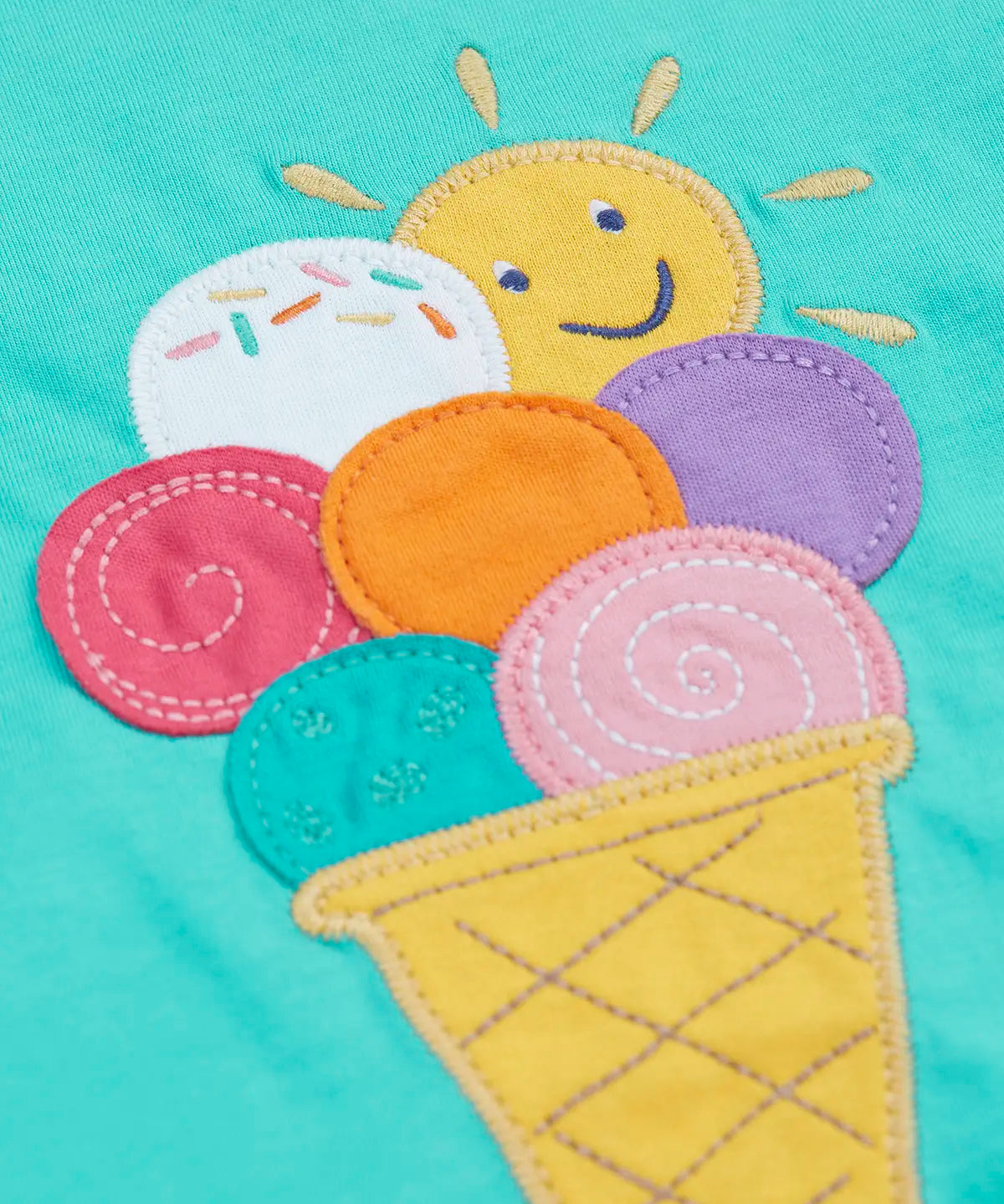 Frugi Harmony circular t-shirt in aqua laid flat showing the ice cream patch 