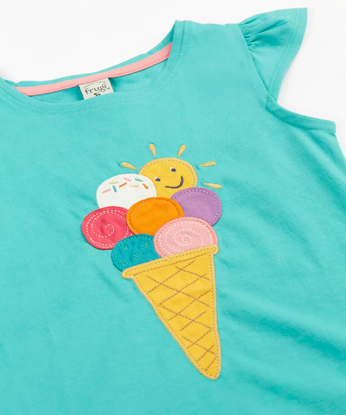 Frugi Harmony circular t-shirt in aqua laid flat showing the ice cream patch on the front and a frill on the shoulders