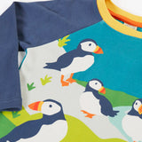 Frugi horizon raglan long sleeve organic cotton top laid flat showing close up of a playful puffin design on the front 