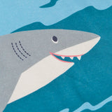 Frugi Iori hotchpotch t-shirt laid flat showing playful swimming shark design on GOTS organic cotton fabric