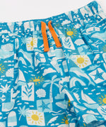 Frugi blue Kai shorts laid flat showing repeating beach inspired designs and orange waist cord